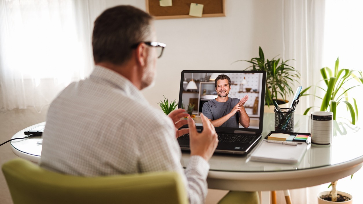Professional participating in an online leadership coaching session